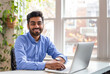 © Tory - Young Man Working on His Laptop in a Bright Modern Office