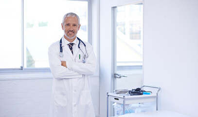 Canvas Print - Doctor, portrait and happy senior man with arms crossed in consultation for medical, advice or help at hospital room. Healthcare, face or male expert with career pride, smile or clinic consulting