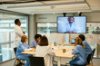 © BONNINSTUDIO/Stocksy - Healthcare workers having video conference with colleague