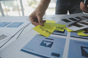 ux Graphic designer creative sketch planning application process development prototype wireframe for web mobile phone . User experience concept.