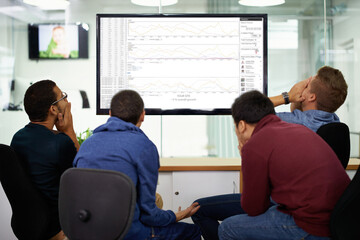 Group, stress and men on computer in office reading coding data, information or research. Frustrated, technology and team of male programmers working on project with crisis on computer in workplace.