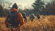 A man wearing an orange jacket and a black backpack is walking through a field