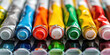 Assortment of Oil Paint Tubes. A vibrant row of oil paint tubes, showcasing a rainbow colors. Background for the art supply store, copy space.