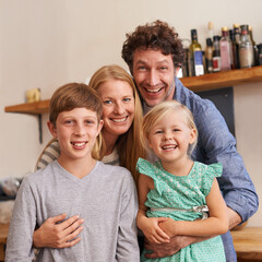 Poster - Parents, family and portrait with children in kitchen for holiday relax or together for weekend, good mood or bonding. Mother, father and siblings or face in apartment for happy, vacation or break