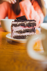 Wall Mural - A Slice of Cake on a White Plate