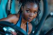 African American woman doing cardio on exercise bike for health and wellbeing