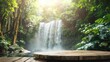 wood table top podium in outdoors waterfall green lush tropical forest nature background