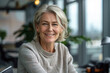 © Dennis - Business portrait of a smiling female senior CEO in her office