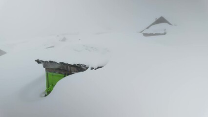 Wall Mural - Germaneska meadow in the Carpathians, Ukraine, in the summer live shepherds of cows and sheep, and in winter fog and snowfall cover the roof