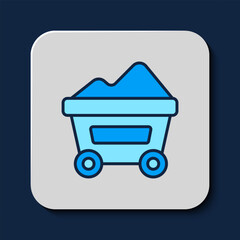 Poster - Filled outline Coal mine trolley icon isolated on blue background. Factory coal mine trolley. Vector