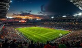 Fototapeta Sport - Night game at the stadium, bright lights illuminate the field, highlighting the action.