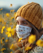 portrait of a woman wearing a dust mask in a flower field