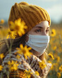 portrait of a woman wearing a dust mask in a flower field