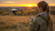 Female Farmer in a field at sunset, operating a drone, which symbolizes modern agricultural technology and innovation.