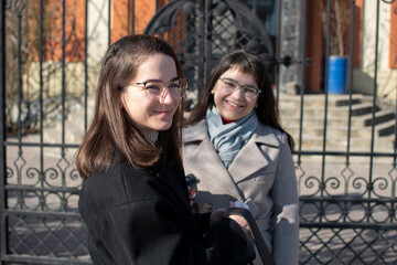 Portrait of a two young women in eyeglasses