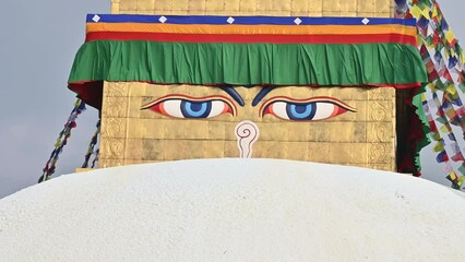 Wall Mural - The wisdom eyes on great Boudhanath Stupa in Kathmandu, Nepal. The Great Boudhanath Stupa, built in the 5th century, is one of the most ancient, largest and magnificent Stupas in the world.