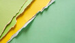 Torn ripped pastel colorful paper pieces. Green and yellow. Abstract background.