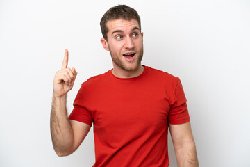 Wall Mural - Young caucasian man isolated on white background intending to realizes the solution while lifting a finger up