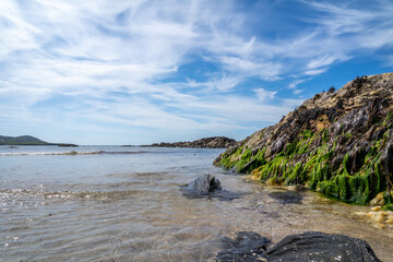 The rocks of Carrickfad by Portnoo at Narin Strand in County Donegal Ireland