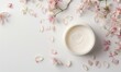 Creme jar blank mockup surrounded by delicate flower petals