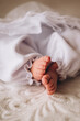 Newborn feet in bed