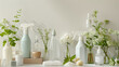 Spring cleaning concept with plastic bottles for cleaning and freshness next to spring flowers on light background