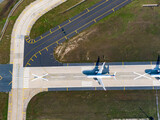 Fototapeta Londyn - Aerial view of an airport. aerial view of airport terminal with parked airplanes