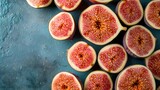 Fototapeta Kuchnia - Halves of appetizing figs background