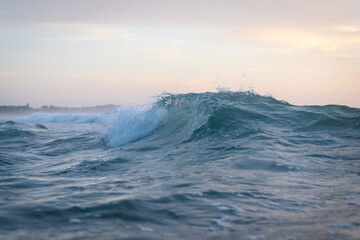 Wall Mural - A small wave in the ocean.