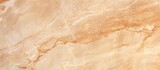 Fototapeta Desenie - A detailed, upclose view of a luxurious brown marble texture featuring hints of beige, amber, and peach tones. The exquisite pattern resembles hardwood flooring with a touch of furlike softness