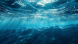 Dark blue ocean surface seen from underwater, Underwater light rays background