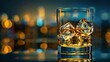 Whiskey on the rocks  glass with ice cubes on minimalist background for text placement