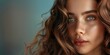 Background of a woman with long luxurious curly hair. Hair beauty of a woman with healthy curly hair. Hair cosmetics concept.