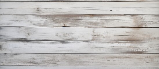 Poster - A closeup of a rectangular white wooden wall with a hardwood flooring in grey color. The wood texture creates a beautiful brickwork pattern