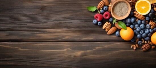 Wall Mural - Assorted Fruits and Nuts Displayed on a Rustic Wooden Table for a Healthy Snack Concept