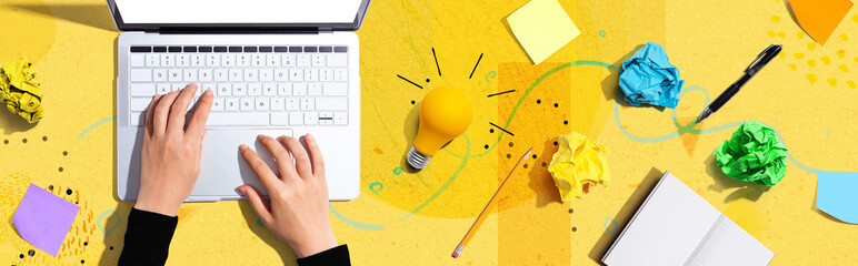 Poster - laptop computer with a light bulb from above