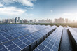 Sustainable Energy with Solar Panels by Urban Skyline