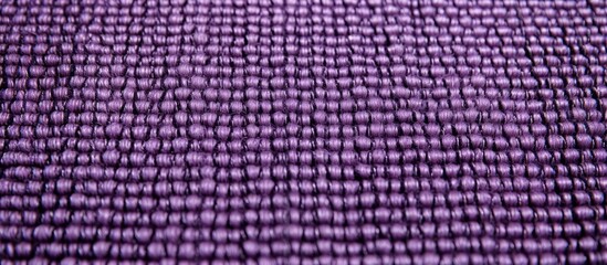 Sticker - A close up of a purple plaid fabric with a checkered pattern, featuring shades of grey and violet. The pattern shows circles and symmetry, resembling a plant design