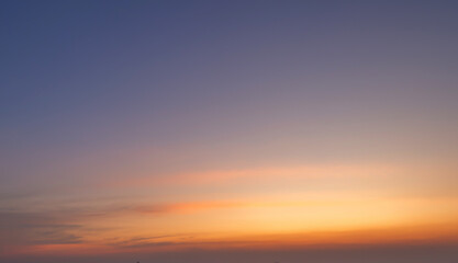 Wall Mural - Sunset sky. Abstract nature background. Dramatic blue with orange colorful clouds in twilight time.