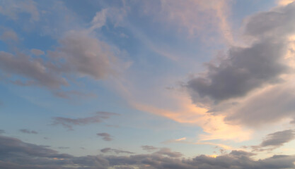 Wall Mural - Sunset sky. Abstract nature background. Dramatic blue with orange colorful clouds in twilight time.