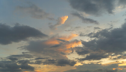 Wall Mural - Sunset sky. Abstract nature background. Dramatic blue with orange colorful clouds in twilight time.