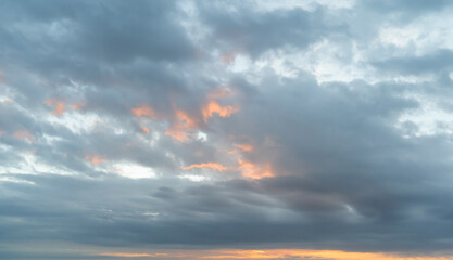 Wall Mural - Sunset sky. Abstract nature background. Dramatic blue with orange colorful clouds in twilight time.