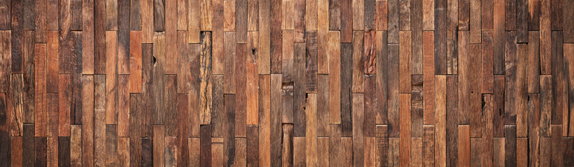 Wall Mural - brown wooden wall as background. rustic wood texture from small planks