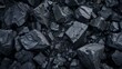 © LAYHONG - Pile of coal. Black coal texture background. Top view.
