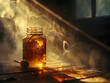 A dramatic still life of a glass jar filled with honey.
