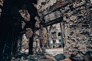 destroyed and burned houses in the city during the war in Ukraine