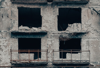 destroyed and burned houses in the city during the war in Ukraine