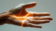 Human Hand Glowing with Dynamic Orange Energy.