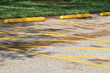 parking spaces yellow lines shading by tree