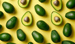 close up of avocados flat lay wallpaper,  on pastel yellow background, food / kitchen background 
